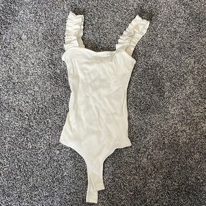 Jolie body suit, off white colored. size xs.